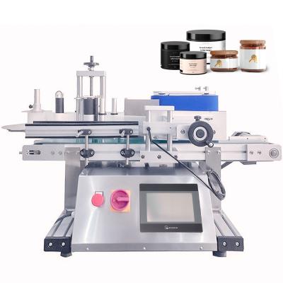 China YM415 Automatic Label Applicator for Round Bottle Positioning Labeling Machine for sale