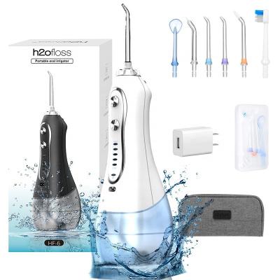 China IPX7 Waterproof dental oral irrigator water flosser h2o toothpick h2ofloss oral flosser teeth clean dental irrigator ipx7 OEM for sale