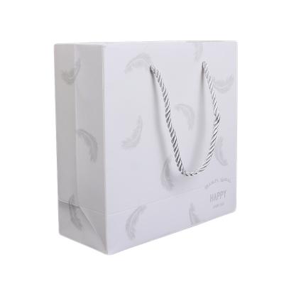 China Custom Hot Sale Recycled Fashion Custom White Kraft Paper Gift Bag With Your Logo for sale