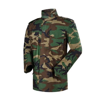 China Chaqueta de combate táctico de camuflaje de bosque personalizado para hombres para entrenamiento al aire libre en invierno en venta