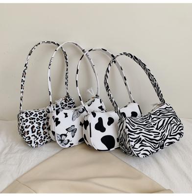 China 2022 High Quality Fashion New Retro Sling Bag Luxury Cow Zebra Print Personalized Purse For Women Cute Handbag for sale