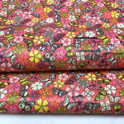 China Memory high quality flower PVC coating fabric with WR for rainwear/raincoat/soft poncho fabric for sale