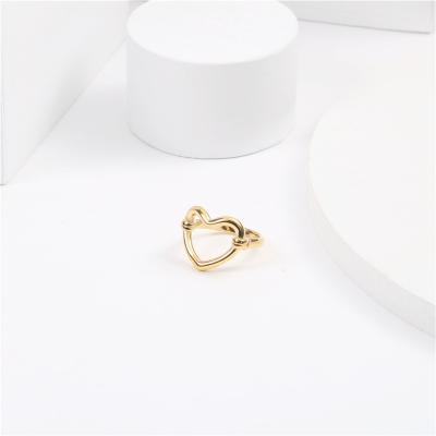 China New Trendy Styles Stainless Steel 18K Gold Plated Hollow Heart Women Hand Ring Jewelry for sale