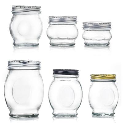 China Recyclable Certified Clear Cheap Drum Shape Customized Unique Glass Honey Jars For Jam / Decorative Honey Jars for sale