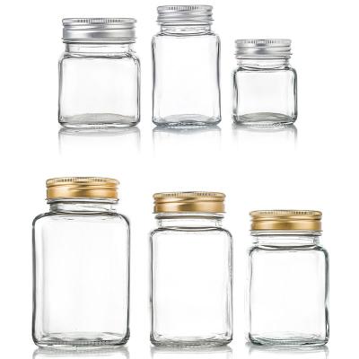 China Free Sample 100ml 200ml 300ml 380ml 500ml 730ml Cylinder Recyclable Honey Jar Glass Jam Jar With Lid for sale