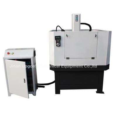 China Heavy UG-6060 Mold CNC Milling Engraving Machine with Hybrid Servo Motor/Auto Lubrication for sale