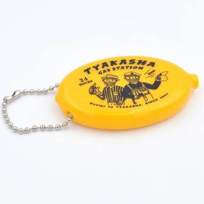 China Wholesale Custom Change Rubber Oval Soft Plastic Coin Purse Holder Promotion Squeeze Coin Purse for sale