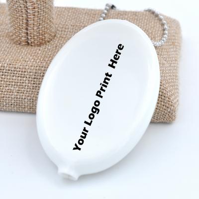 China Wholesale Custom Oval Coin Holder Promotion Change Purse Key Chain Squeeze Rubber Coin Holder for sale