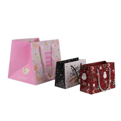 China Recyclable Wholesale Small Christmas Gift Bags Christmas Candy Paper Bag for sale