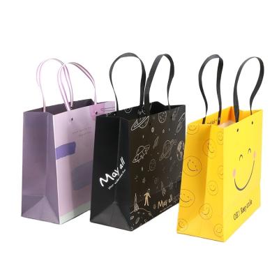 China OEM Recyclable Eco Friendly Custom Printed Craft Paper Gift Packaging Bags for sale