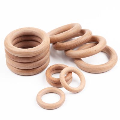 China 100% Best Selling Eco-Friendly Beech Baby Wooden Teethers DIY Newborn Necklace Bracelets Making Wooden Teether for sale