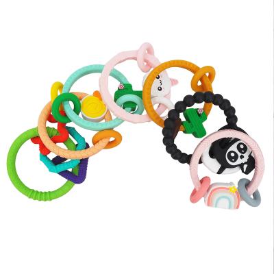 China 100% Bpa Free Eco-friendly Fashion Easy To Hold Teething Infant Molar Ring Toy Baby Teether Shower Gift Wristband for sale