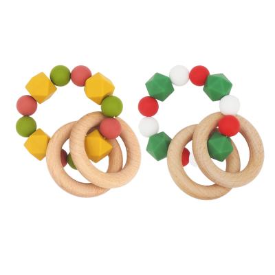 China Eco-friendly Fashion Rattle Ring With Silicone Beads BPA Free Natural Wood Silicone Baby Teething Toy Ring for sale