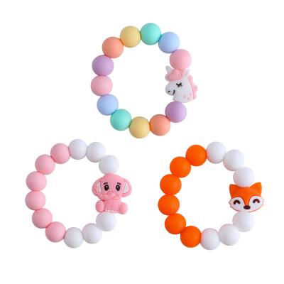 China Hot Sale Eco-friendly Animal Colorful Silicone Baby Food Bracelet Bead Silicone Cartoon Molar Bracelet for sale