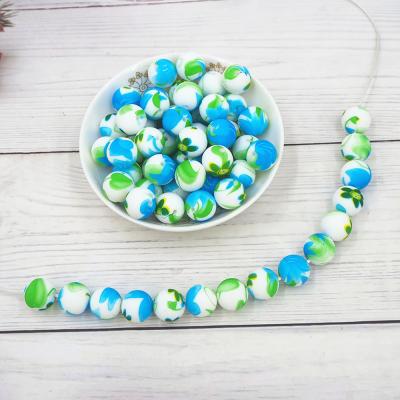 China Buy 12mm Eco-Friendly Buy 12mm Silicone Bead DIY Food Grade Printing Round Ball Loose Infant Chewable Infant Teether Bead for sale