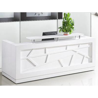 Chine Vente en gros Salon de beauté de design de luxe Bois Blanc Meubles de bureau modernes comptoir en forme de L Bureau de réception à vendre