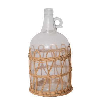 China Rustic Country Style Decorative Rattan Wrapped Narrow Glass Mouth Bottle Vase for sale