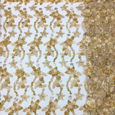 China Viable Tied White 100% Polyester Sequin Fashion Embroidery Rope Lace Fabric With Stones for sale