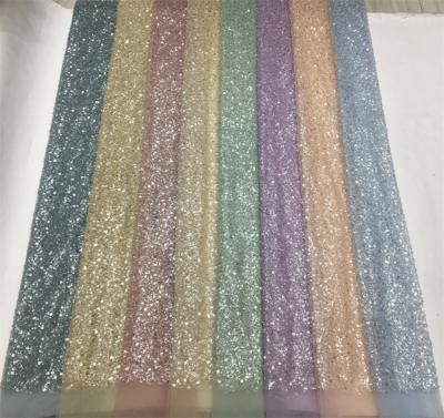 China Viable On Sale Beaded Heavy Density Pearl Green Lace Fabric Evening Beaded Fabrics for sale