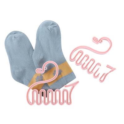 China Behind Doors/On Walls Environmental Friendly Cheap Small Size Plastic Hangers Hanger For Sock Display for sale