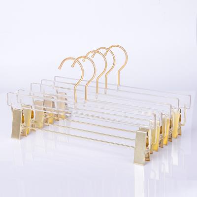 China Non Slip Hangers with Hooks Wholesale Custom Logo Skirt Display Pants Hangers with Clear Acrylic Gold Clips Hangers for sale