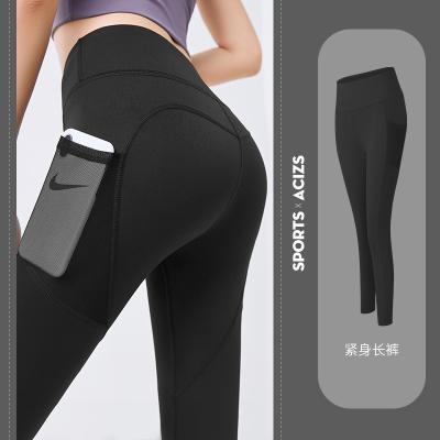 China Breathable Outlet Pocket High Waist Yoga Pants Tummy Control Workout Yoga Gaiters Active Wear For Women for sale