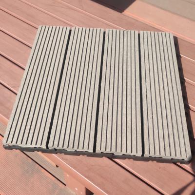 China Asian 300* 300 mm outdoor interlocking gray tiles wpc composite diy swimming pool wood decking for sale