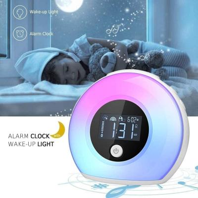 China Cartoon good quality small music wireless lamp with light digital friendship table speaker alarm clock rechargeable table lamp for sale