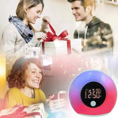 China 2021 New Children's Multi Function LED Alarm Clock Rainbow Lamp Night Light Eclectic Wireless Alarm Clock for sale