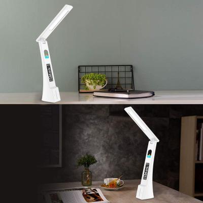 China Modern hot selling careful and considerate multifunctional led children study desk table lamp for sale