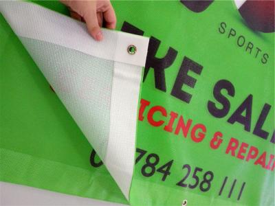 China outdoor mesh fence banners with hem edge and grommets for sale