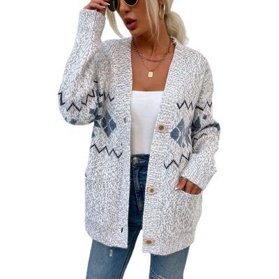 China Anti-wrinkle Women's Christmas Snowflake Knit Single Breasted Pocket Sweater Women's Cardigan for sale