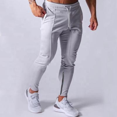 China QUICK DRY Gym Tight Men's Sport Jogger Drawstring Workout Pants Wholesale Mens Trousers Pants Side Pocket Sweatpants Jogger Pants Men for sale