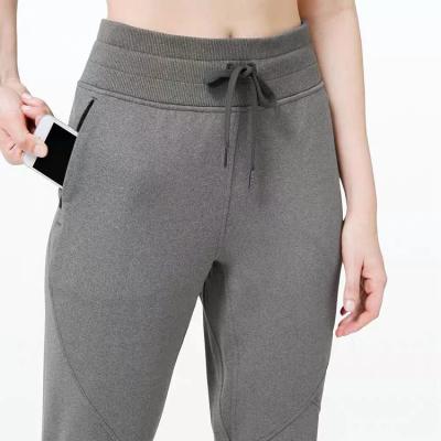 China QUICK DRY Women's Gym Elastic Women's Sports Joggers Ladies Lightweight Slim Fit Joggers Sweatpants For Women for sale