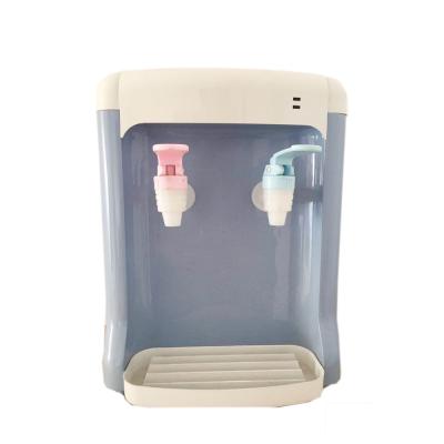 China hot & Small Size Mini Hot Cold And Bottle Cold Table Top Desktop Water Dispenser Machine for sale