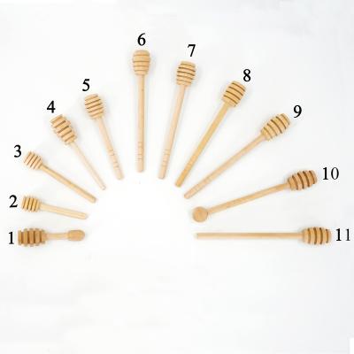 China Viable Wholesale Multiple Grades Quality Honey Spoon Wooden Honey Stick Natural Dipper for sale