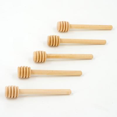 China Sustainable Wholesale Custom Multiple Sizes Natural Export 10cm Honey Dipper Wooden Honey Stick Spoon for sale