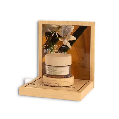 China Environmental Friendly Wholesale Cosmetic Cream Product Display Stand Clear Acrylic Display Stand With Wooden Base for sale