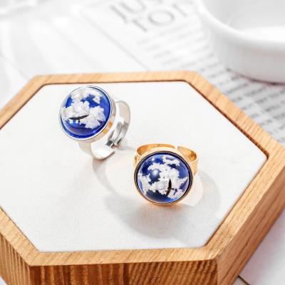 China 2021 FASHIONABLE white clouds Ring Jewelry Set New Fashion Handmade Round Sky Ball Resin Ring Transparent Women Rings Blue for sale