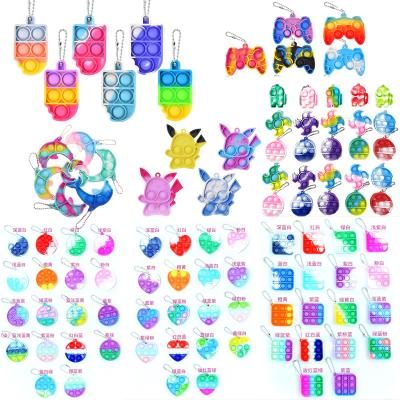 China Playing Mini Fidget Toys Keychain Autism Push Noise Bubble Popping Popit Kids Sensory Wiggle Toys Key Chain for sale