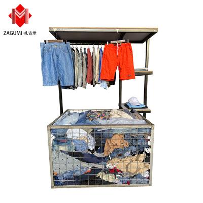 China Polyester/cotton second hand wholesale clothing UK ZAGUMI used clothes in latest bales prices men capri pants for sale