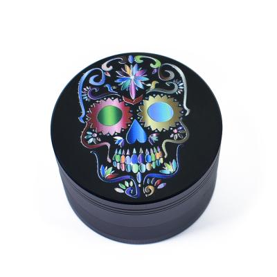 China Cheap Tobacco Spice Grinder 4 Part 63mm Metal Skull Printing Herb Zinc Alloy Grinder for sale