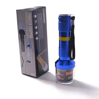 China New Metal Novelty Unique Design Automatic Electric Dry Battery Flashlight Herb Tobacco Grinder for sale