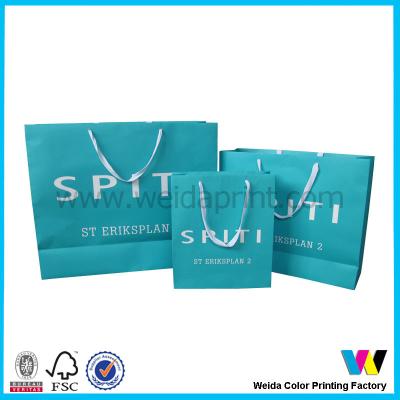 China Custom Blue Printed Paper Shopping Bags With Ribbon String UV for sale