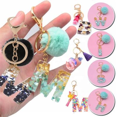 China Direct Maker Girl's Alphabet Acrylic Resin Colored Custom Key Chain Real Flower Eco-Friendly Glitter Resin Accessory With 26 Letters for sale