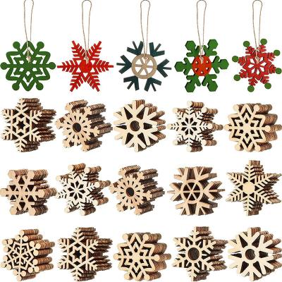 China High Quality Europe 10 Unfinished Wooden Snowflake Ornaments Hollow-out DIY Christmas Tree Snowflake Decoration With Rope Wood Crafts for sale