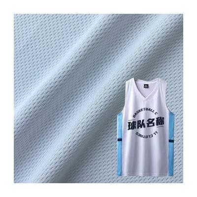 China Tejido de jersey 100% poliéster de panal de miel malla de ojo de pájaro tela deportiva de ajuste seco para ropa deportiva en venta