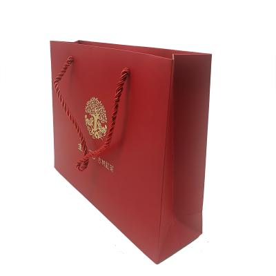 China Recyclable Custom Unique Commercial Luxury Color Printing Gift Shopping Paper Bag for sale