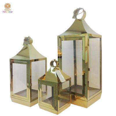 China Christmas LED candle Decorative stainless steel lanterns with Glass for sale