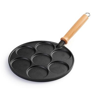 China Cute 4 Holes General Use For Gas Cooker And Induction Cooker Cast Iron Egg Shaped Cake Mold Egg Pan Nonstick Pan for sale